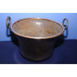 Extremely large and ornate copper and iron handled pan