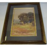 Gilt framed watercolour depicting hay stacks by J P Gethin (size approx.