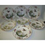 Six 20th C Italian plates with relief moulded hand-painted heron and swan pattern with gilt frilled