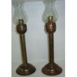 19th C nickel plated storm lamp candlesticks with shaped glass shades (38cm high)