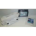 Selection of Concorde items including Corgi boxed pair of die cast models, 2004 calendar unopened,