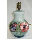 Moorcroft Hibiscus pattern lamp base on green ground