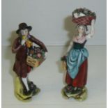 Pair of 19th C Dresden porcelain figurines depicting couple selling grapes with painted marks to