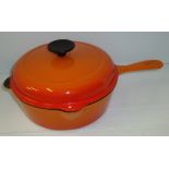 Le-Creuset orange cast iron pan and lid