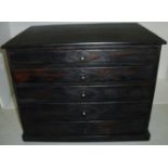 Painted pine five drawer specimen chest with carved applied diamonds detail and turned wooden knobs