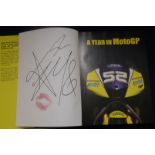 Signed Ten Kate James Toseland t-shirt and associated hard back edition of Year in Motor GP singed