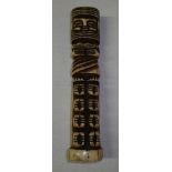 Carved bone totem,