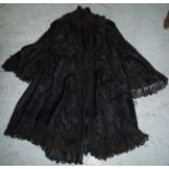 Victorian embroidered damask frock style coat with lace fringing to the sleeves,