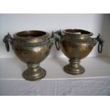 Pair of Indian brass urns with elephant mask handles,