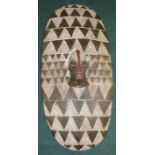 African carved wood oval shield with car