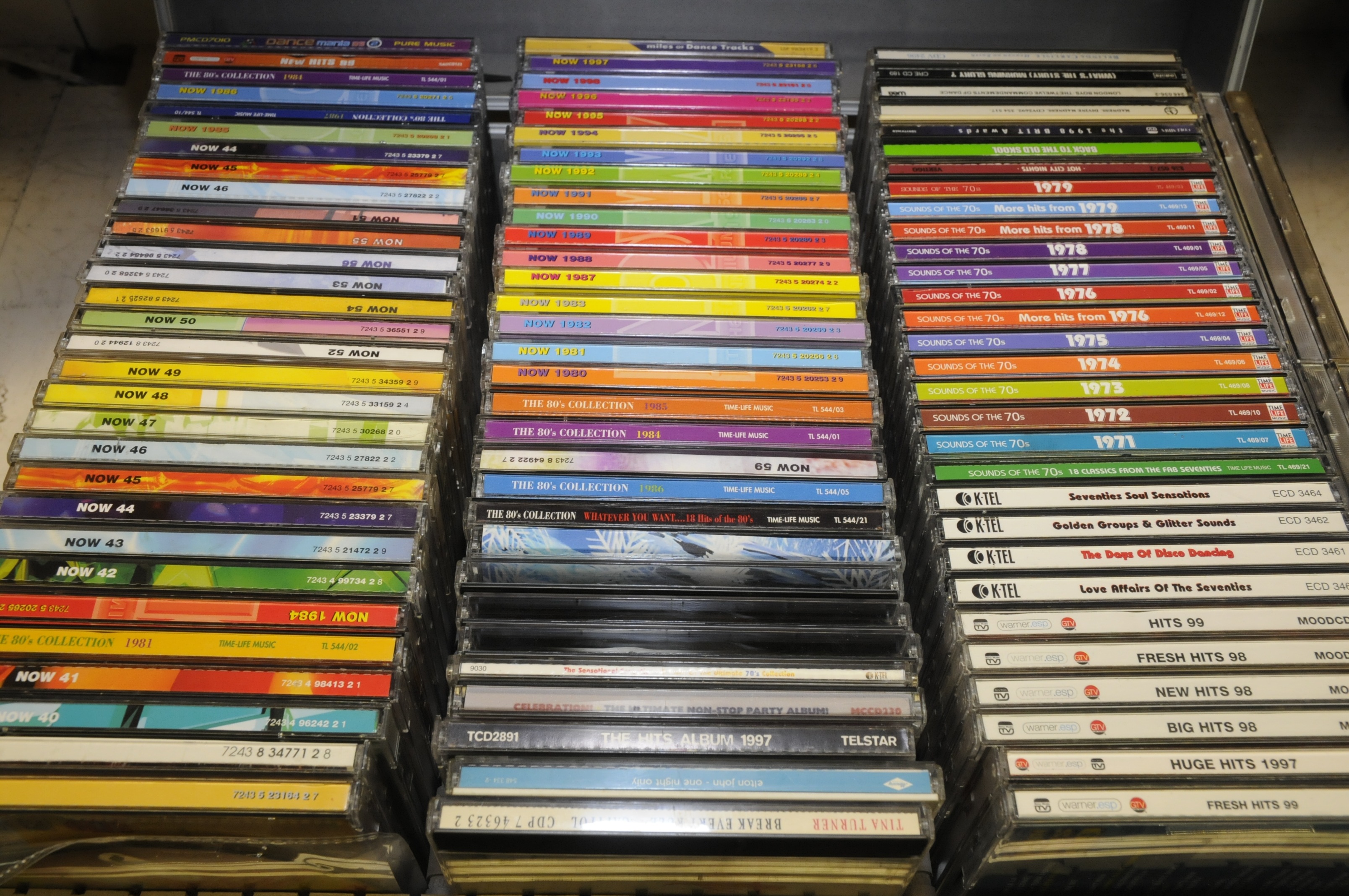 Case containing a large selection of CD's including various 'Now' compilation albums,