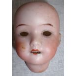 Small German Walther & Oberender bisque dolls head 200-7/0 with crown W&S mark 7/0 with defined