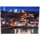 Framed and mounted photographic print depicting Whitby Abbey And Harbour At Night (49cm x 39cm