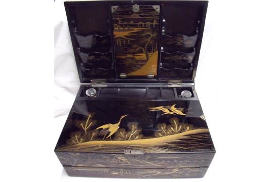 Early 20th C Japanese lacquered writing box the rectangular hinged lid with gilt and red lacquer