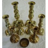 Pair of 19th C brass push candlesticks with elaborate turned columns and rectangular bases (height