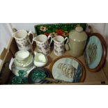 Three graduating Ironstone jugs decorated with viola's, stoneware hot water bottle,