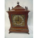 Oak cased mantel clock with brass mounts and dial the striking movement marked Leazkirch A.G.