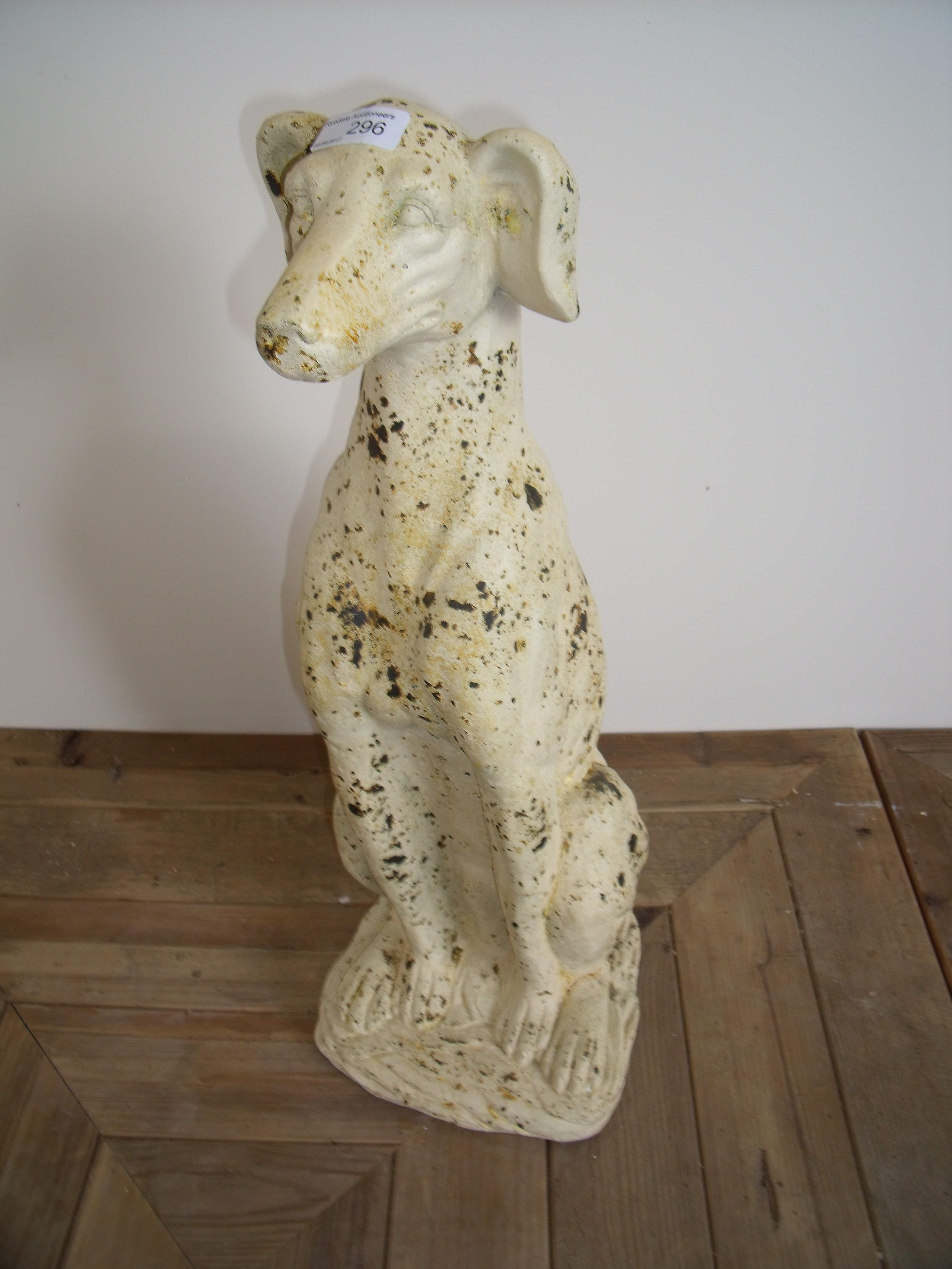 Composite figure of a seated lurcher style dog in white finish