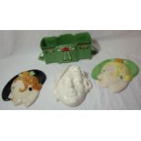 Three Art Deco wall hanging wall masks in the form of ladies heads from the 1930's and an Art