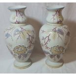 Pair of opaque glass baluster shaped vases with hand painted enamel floral decoration (height 32cm)