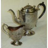 Silver plated coffee pot and milk jug on semi lobed body with pedestal base