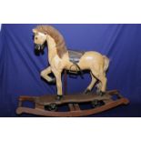 19th/20th C carved wood pull along horse mounted onto rockers (overall length 84cm,