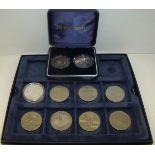 Cased pair of Queen Elizabeth II 80th Birthday five pound coins and eight commemorative five pound