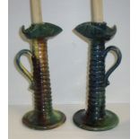 Pair of Linthorpe style Studio Ware candlesticks with ribbed column and turned handle and flared