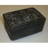 Small pewter box with heavily embossed design to the lid and scrolled floral and griffin to the