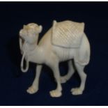 19th C carved ivory figure of a camel (height 7cm)