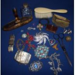 Small selection of costume jewellery including brooches, glass scent bottle with white metal top,