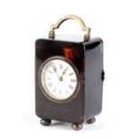 Property of a lady of title - an Edwardian silver mounted tortoiseshell carriage clock timepiece,