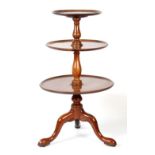 Property of a gentleman - a George III mahogany three-tier dumbwaiter, with cabriole legs & inset