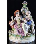 Property of a lady - a 19th century Vienna porcelain group of a courting couple with a dog,