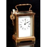 Property of a gentleman - an early 20th century French brass corniche cased carriage clock