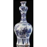 An 18th century German blue & white fayence octagonal baluster vase with garlic neck, probably Hanau