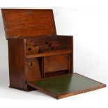 Property of a gentleman - an early 20th century oak writing box, with hinged top & fall front,