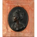 Property of a lady - Picaud (early 20th century) - a bronze oval portrait relief bust depicting a