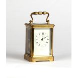 Property of a gentleman - a late 19th / early 20th century brass corniche cased carriage clock,