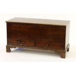 Property of a deceased estate - a George III oak mule or marriage chest with two drawers, on bracket