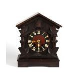 Property of a gentleman - an early 20th century Black Forest mantel cuckoo clock, 11.75ins. (29.