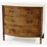 Property of a lady - an early 19th century Regency period mahogany bow-fronted chest of three long