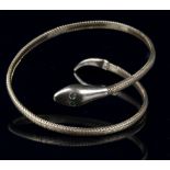 Property of a lady - a 9ct gold snake bracelet, with green 'stone' eyes, approximately 13.8 grams (