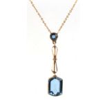 Property of a deceased estate - a 9ct gold pendant chain necklace set with two bright blue stones,