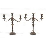 Property of a gentleman - a pair of early 19th century Old Sheffield Plate twin branch candelabra,