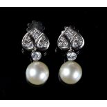 A pair of large single pearl & diamond pendant earrings with heart shaped panels, the pearls each