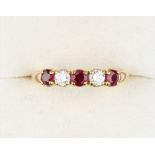 Property of a lady - an 18ct yellow gold ruby & diamond five stone ring, the estimated total diamond