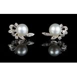 A pair of 18ct white gold single pearl & diamond leaf earrings, the pearls approximately 7mm (2) (