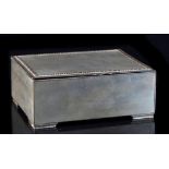 Property of a lady of title - an early 20th century silver cigarette box, with engine turned