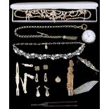 Property of a lady - a bag containing assorted items including a 9ct gold St. Christopher